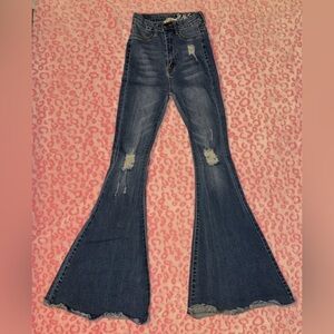 High-Rise Distressed Flare Jeans in Dark Wash
